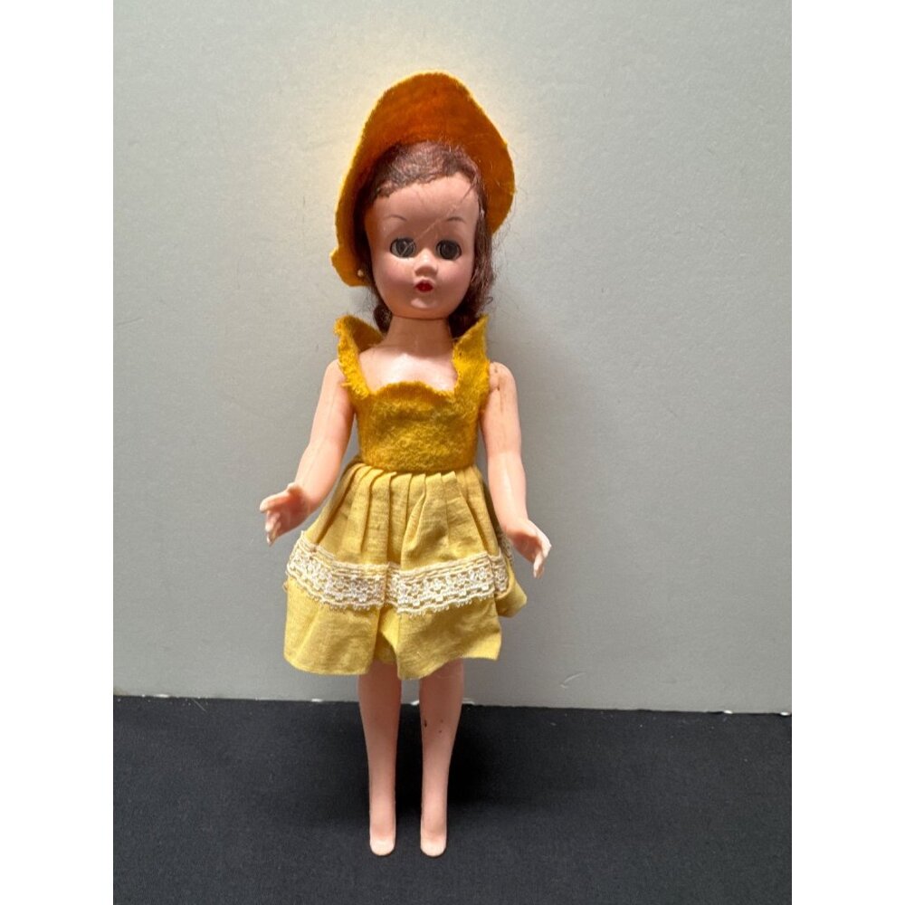 Vintage 1950s 8-Inch Hard Plastic Doll In Yellow Dress With Lace Trim & Matching